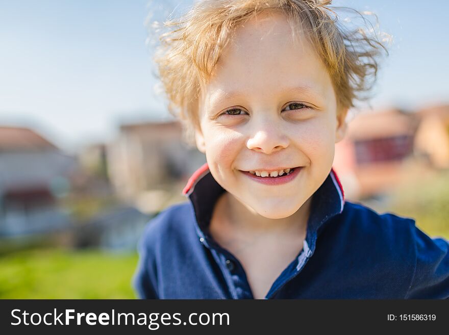 Portrait Of Young Boy Smiling