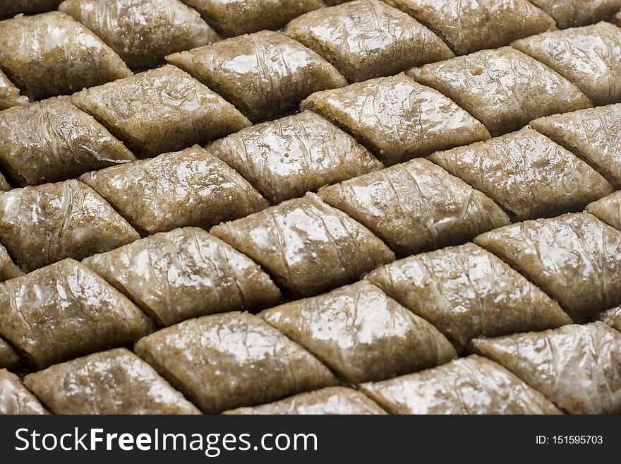 Pieces of Turkish or arabic traditional declious oriental dessert pahlava, baklava