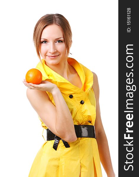 Young Pretty Girl In Yellow Dress With Oranges