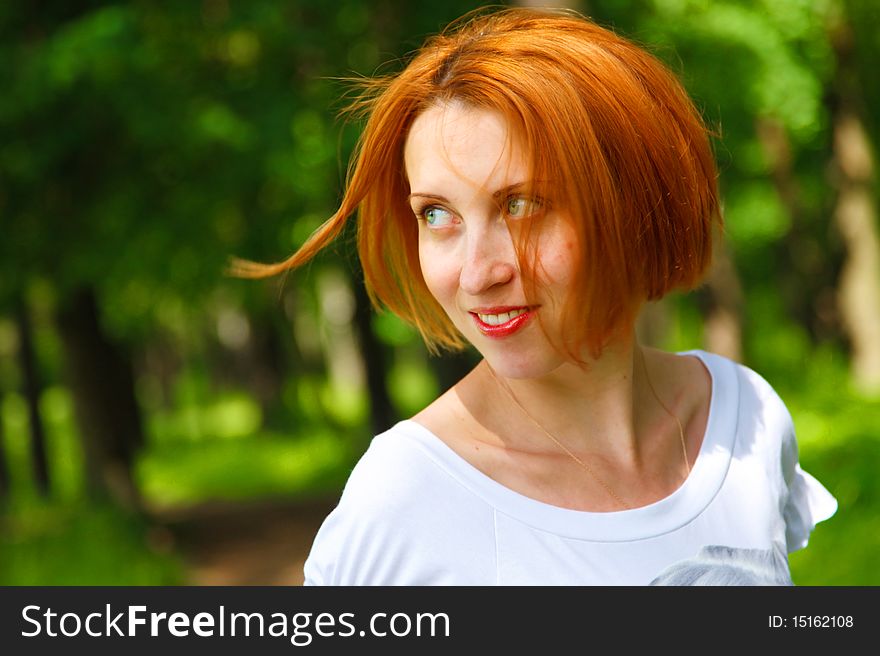 Portrait of young smiling woman with red hairs. Portrait of young smiling woman with red hairs