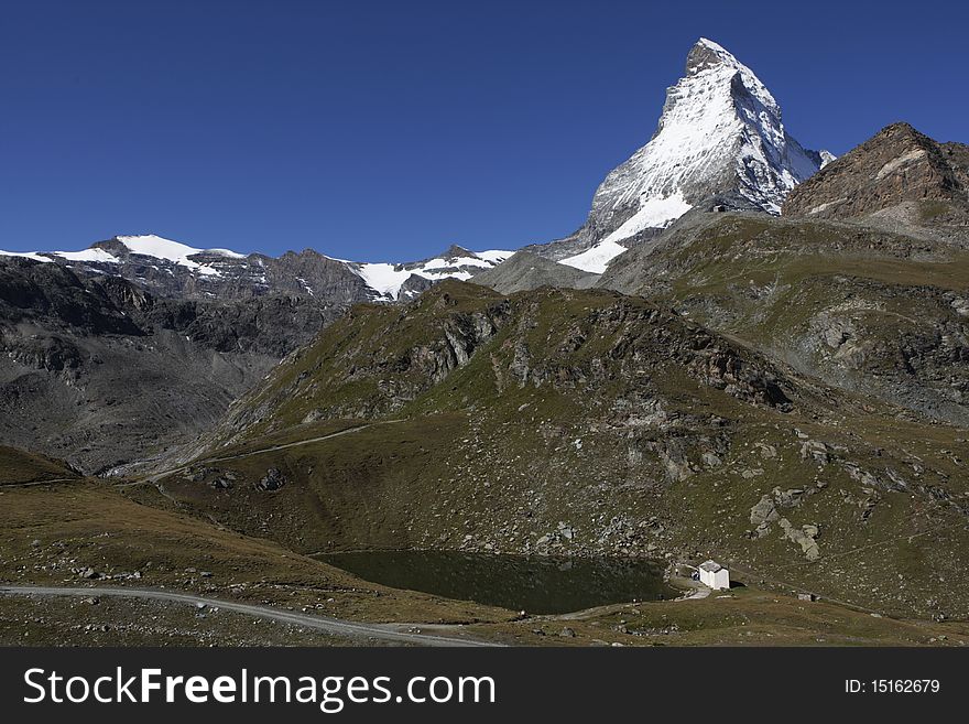 The symbol of the Alps - the Matterhorn, one of the lakes below. The symbol of the Alps - the Matterhorn, one of the lakes below.