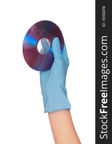 Disk with dangerous confidential audio and video about hacker programs and viruses in a hand of the inspector. Disk with dangerous confidential audio and video about hacker programs and viruses in a hand of the inspector