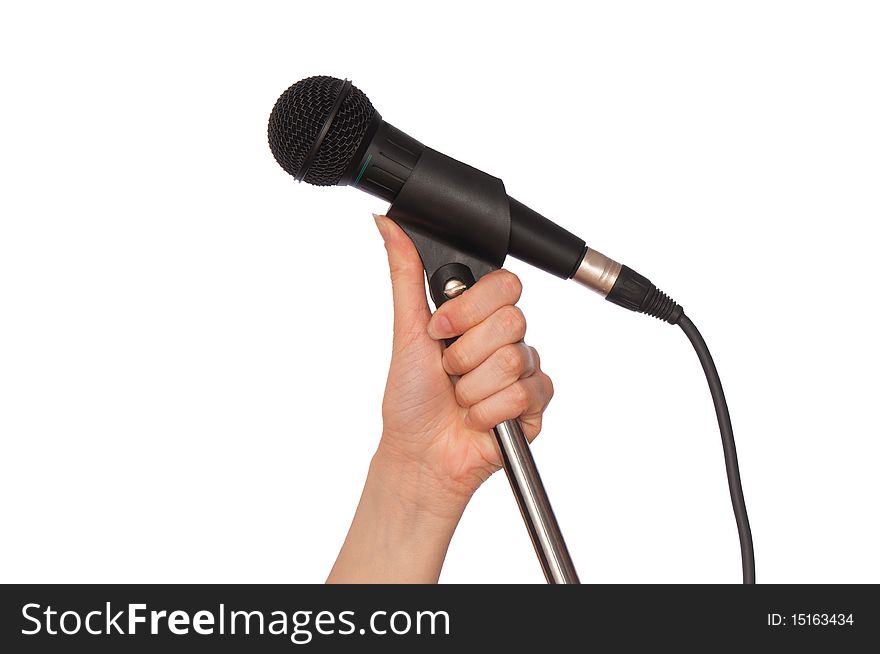 Woman holding big black microphone for singing