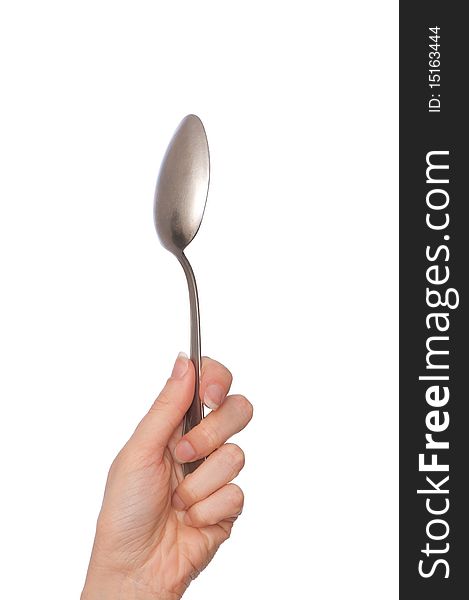 Woman holding tablespoon in the hand for feeding a sick person