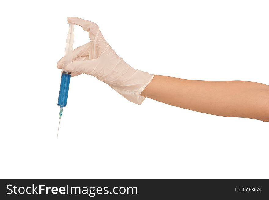 Woman holds in the hand syringe with a new blue color antibiotic. Woman holds in the hand syringe with a new blue color antibiotic