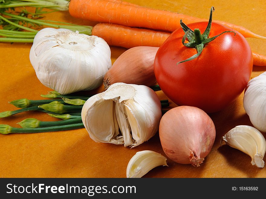 Close up of mixed vegetables of tomatoes, onions, carrots,