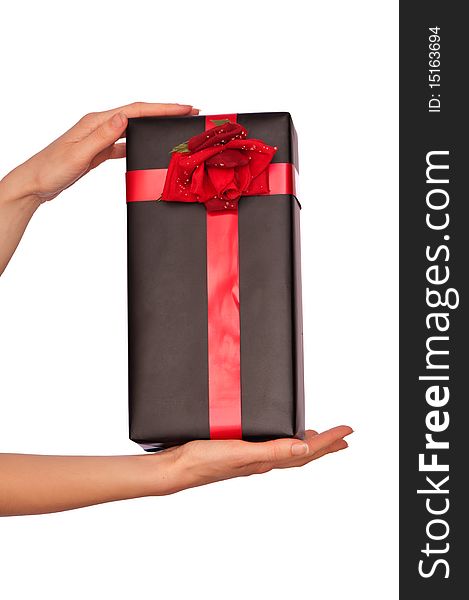 Woman giving a black box with red rose as a gift. Woman giving a black box with red rose as a gift