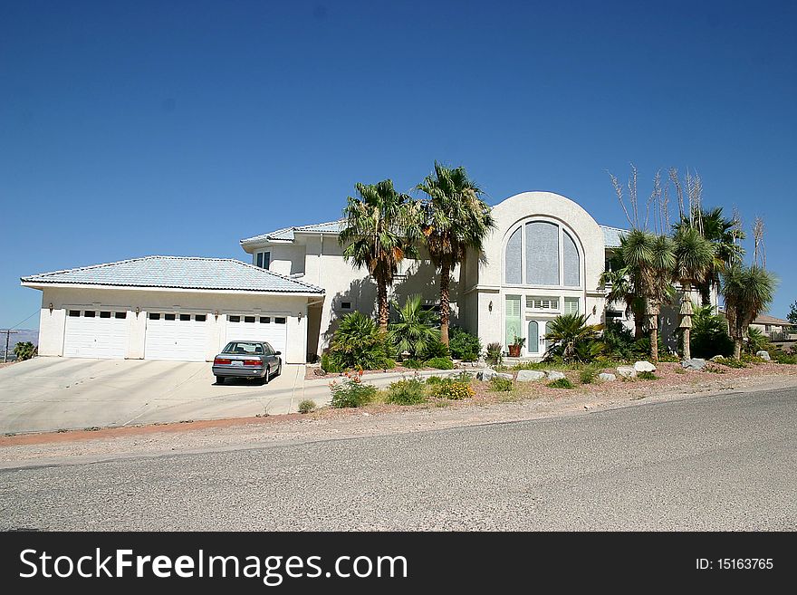 This home looks lopsided but has very nice landscape. This home looks lopsided but has very nice landscape.