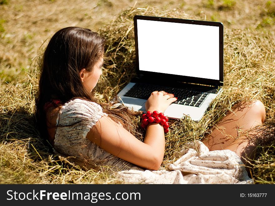 Beauty With Computer On A Farm.