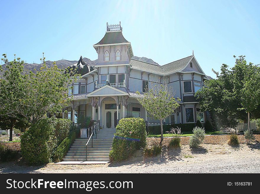 This old victorian style home is massive in size. This old victorian style home is massive in size.