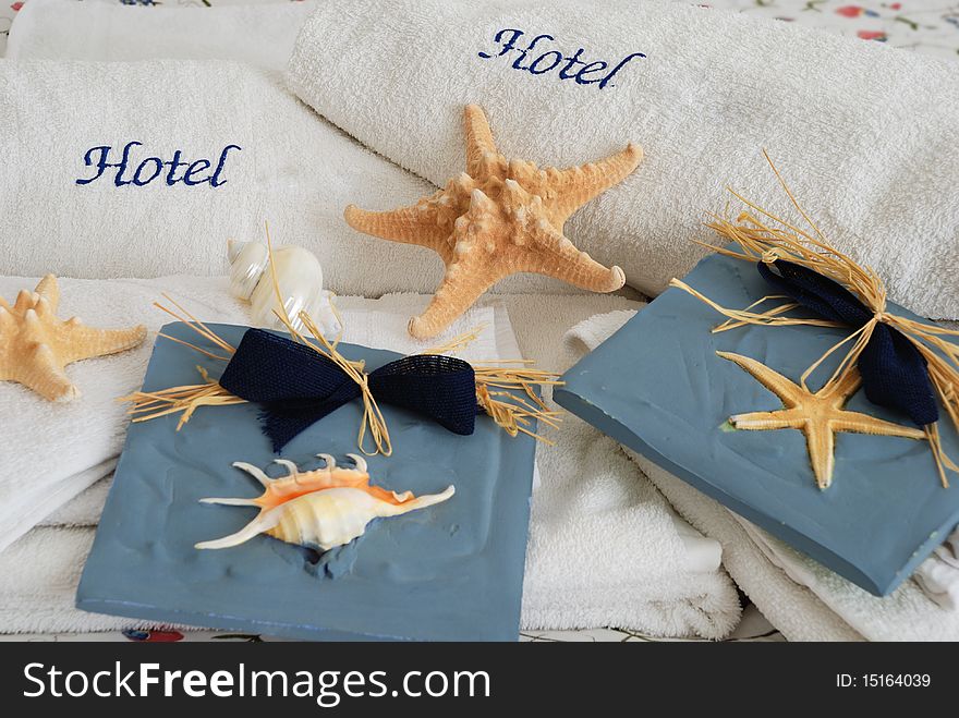 White towels with sea stars and shell