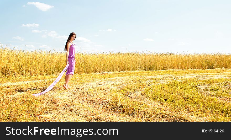 Beautiful Lady Walking In A Field.