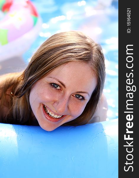 Happy Woman In Swimming Pool