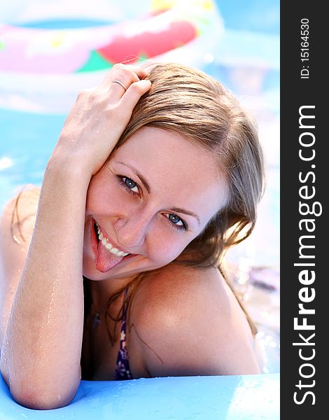 Happy woman in swimming pool