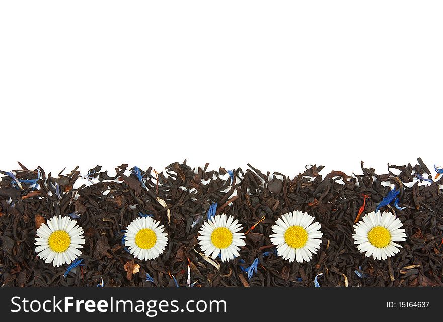 Flowers On The Dry Tea Leaves Background