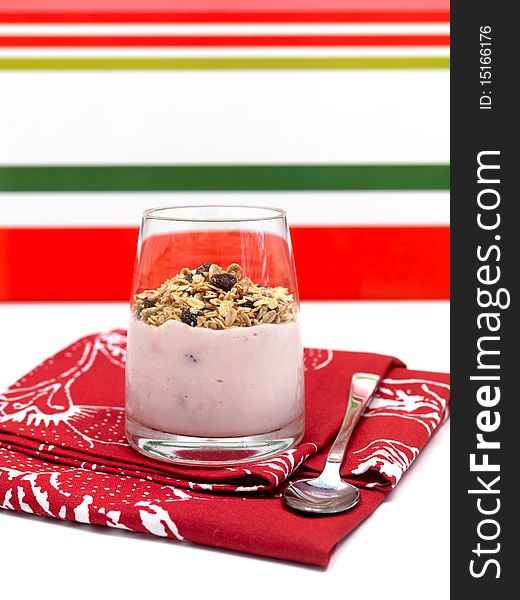 Strawberry yogurt with muesli in a glass. Strawberry yogurt with muesli in a glass