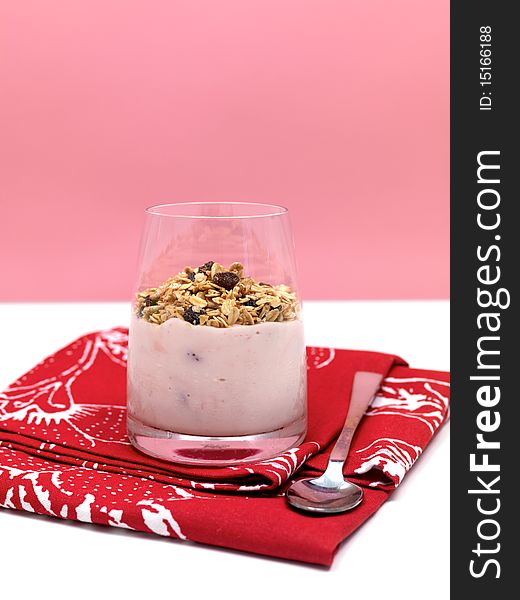 Strawberry yogurt with muesli in a glass. Strawberry yogurt with muesli in a glass