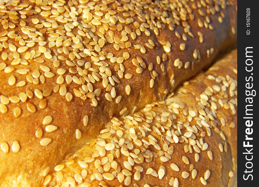 The appetizing ruddy roll strewed by grains. The appetizing ruddy roll strewed by grains