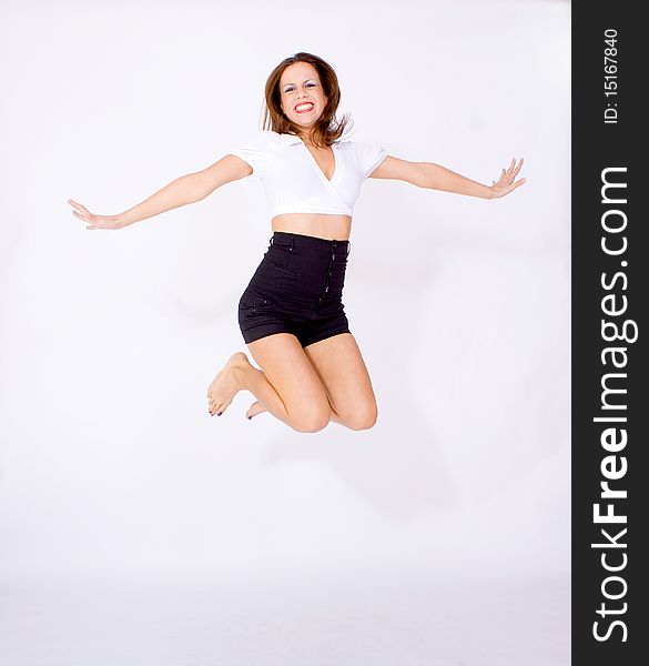 Portrait of young girl jumping. Portrait of young girl jumping
