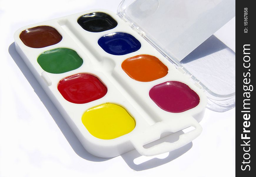 Water colours in a child's paint box.