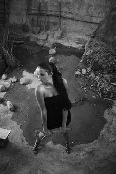Sexual Girl In Black Dress Inside Stone Quarry Stock Photo Sexual Girl In Black Dress Inside Stone Quarry Stock Photo