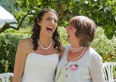 Bride And Her Mother Enjoying A Quiet Moment Stock Photos Bride And Her Mother Enjoying A Quiet Moment Stock Photos