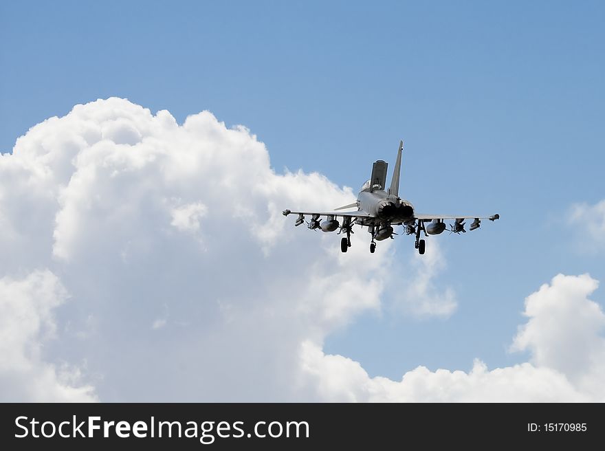 Eurofighter Typhoon applying air brakes during landing descent.