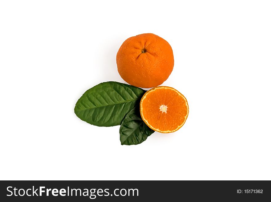 Whole and sliced tangerines with leaves on white background. Whole and sliced tangerines with leaves on white background