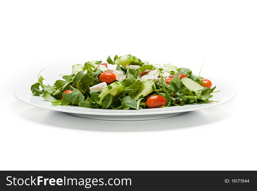 Delicious fresh salad on white