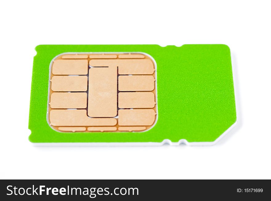 Green SIM card (smartcard). Closeup. The depth of the field is low.