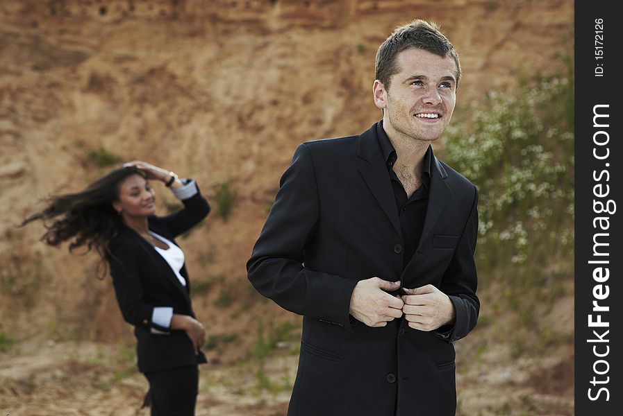 Portrait of smiling handsome businessman outdoor.