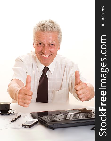 Middle-aged businessman with laptop on white