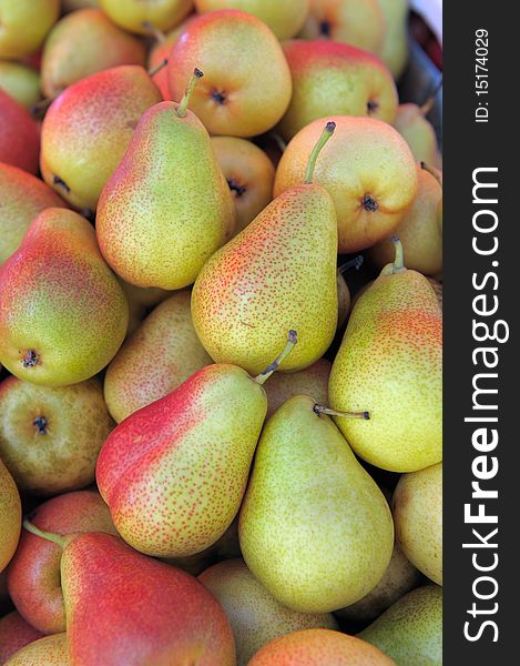 Ripe pears on a market