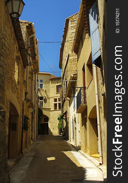 Limestone houses in a nezignan l Ã©vÃªque street in languedoc. Limestone houses in a nezignan l Ã©vÃªque street in languedoc