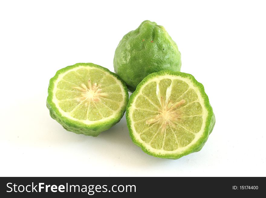 Kaffir limes on white background