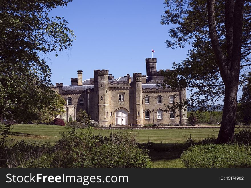 Chiddingstone Castle taken from the surrounding woodland in the county of Kent England.