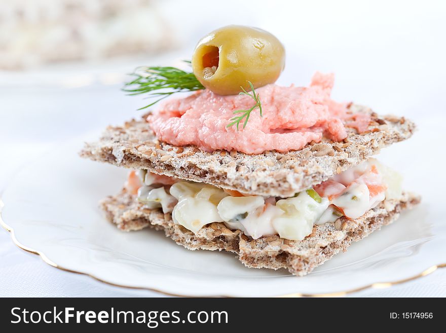 Sandwiches for catering event on white plate