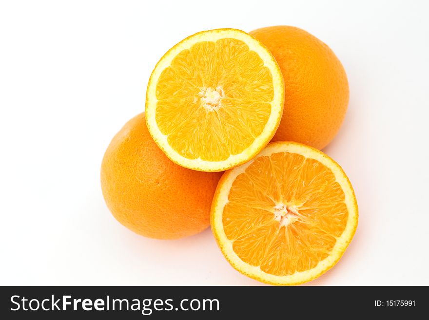 Fresh orange on white table