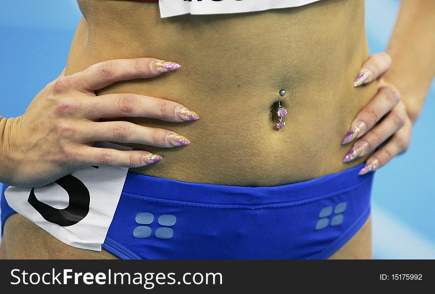 The sportswoman with piercing Navel. The sportswoman with piercing Navel