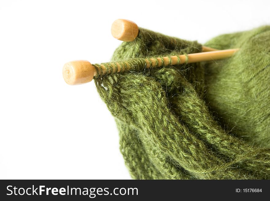 Woolen thread and knitting needles