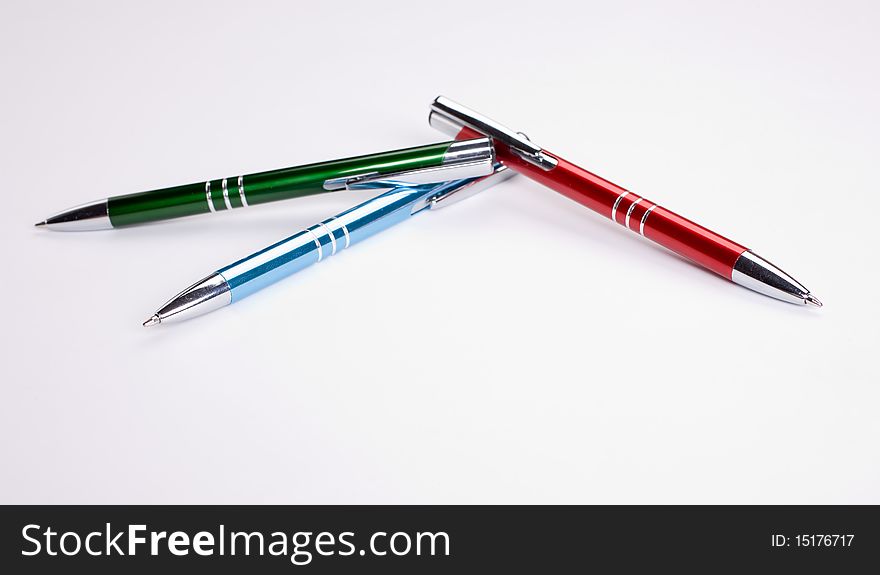 Set of colored pens on white table. Set of colored pens on white table