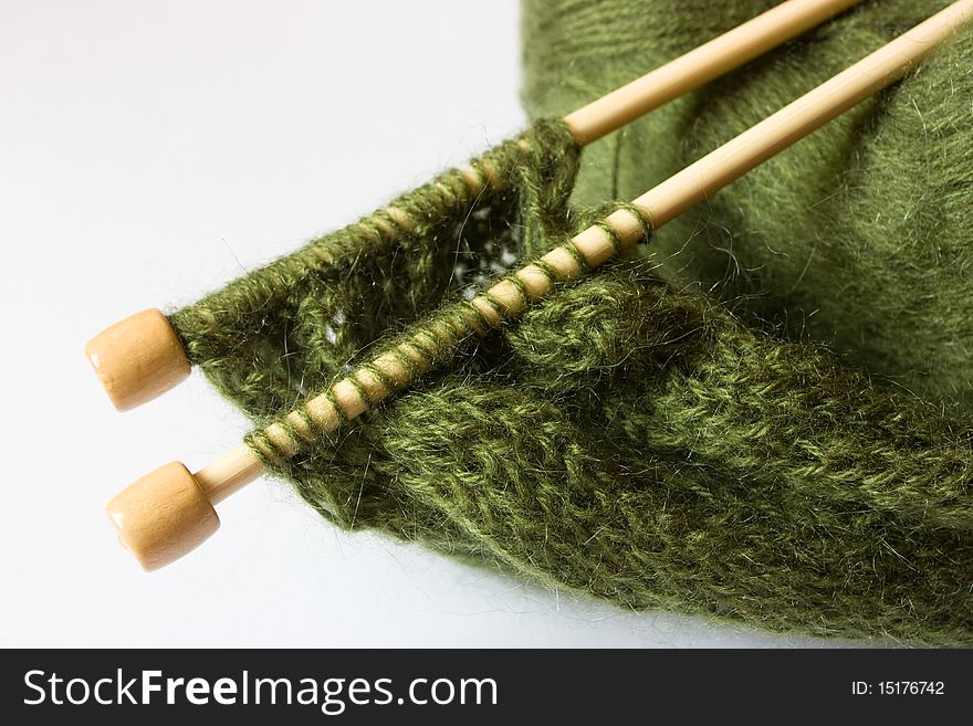 Woolen thread and knitting needles