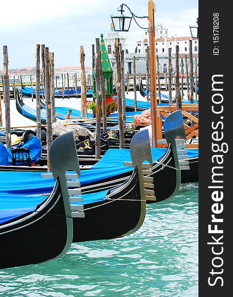 A group of gondolas for hire on the Grand Canal. A group of gondolas for hire on the Grand Canal