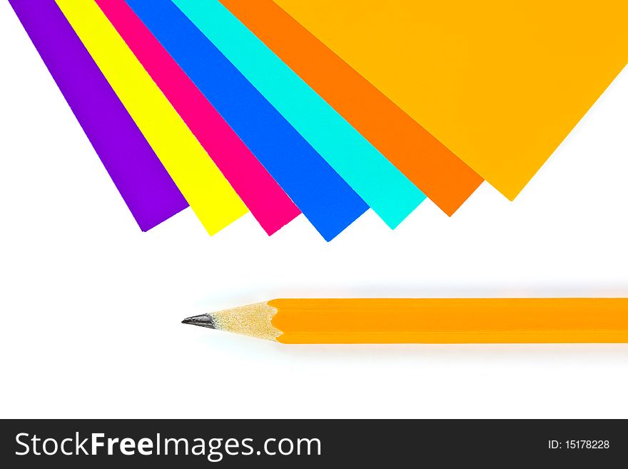 Multicolored paper and pencil isolated on white background