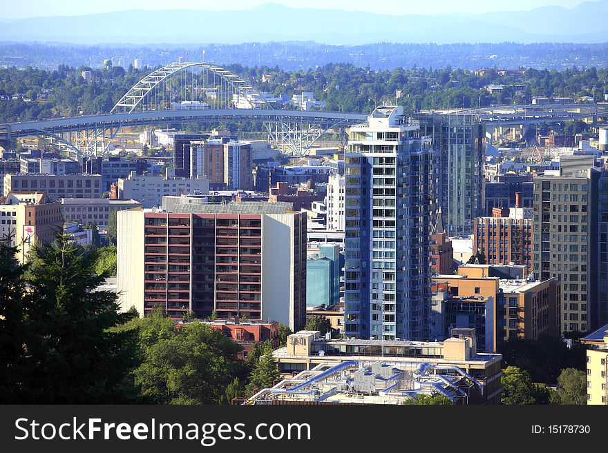 New high rise construction and finished buildings adorn the area close to the Fremont bridge. New high rise construction and finished buildings adorn the area close to the Fremont bridge.