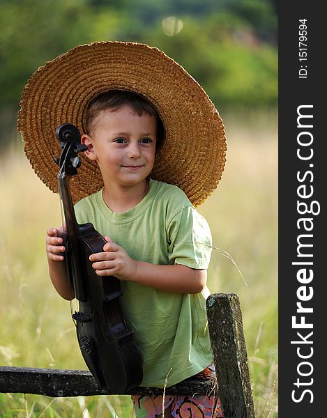 Portrait of a child playing the violin. Portrait of a child playing the violin