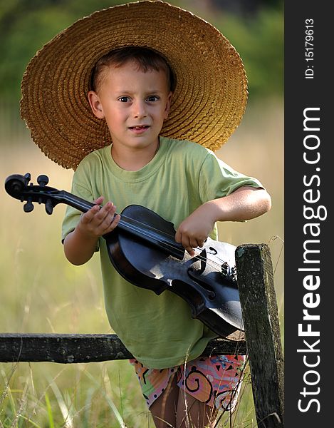 Portrait of a child playing the violin. Portrait of a child playing the violin