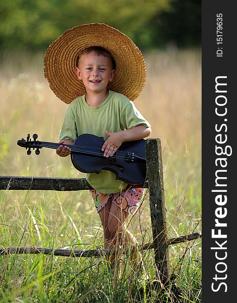 Portrait of a child playing the violin. Portrait of a child playing the violin