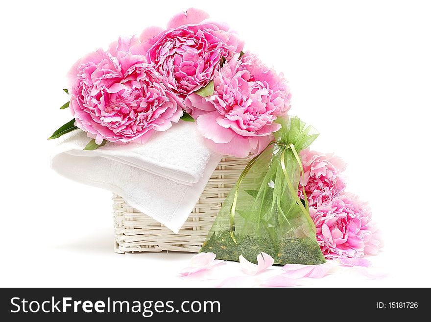 Spa aromatherapy: flower, white towel, bag of natural herbs. Soft focus. Spa aromatherapy: flower, white towel, bag of natural herbs. Soft focus