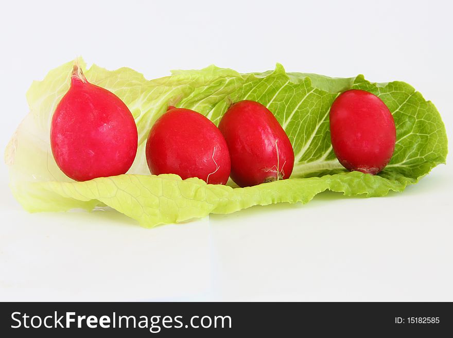 Healthy vegetables radish and lettuce isolated white background. Healthy vegetables radish and lettuce isolated white background